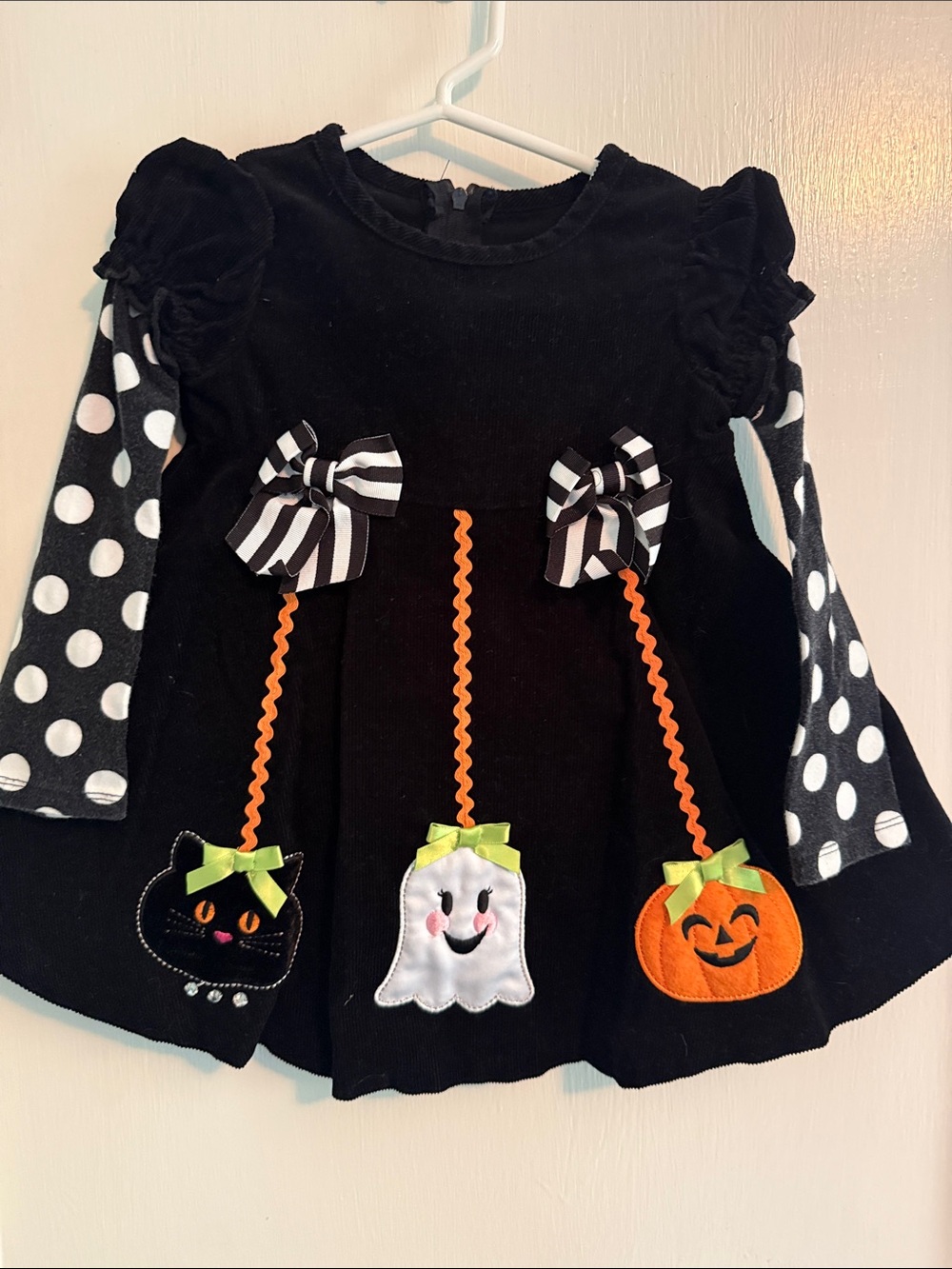Bonnie Baby Black Halloween Corduroy Dress with Polka Dot Sleeves and Appliqués